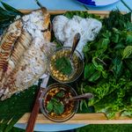 Mieng Pla Plow, or whole salt-crusted roasted tilapia ($33)
